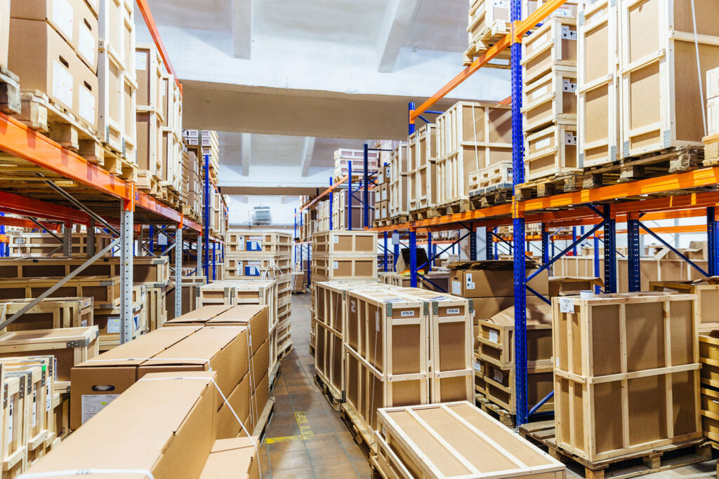 boxed crates in large stocked warehouse